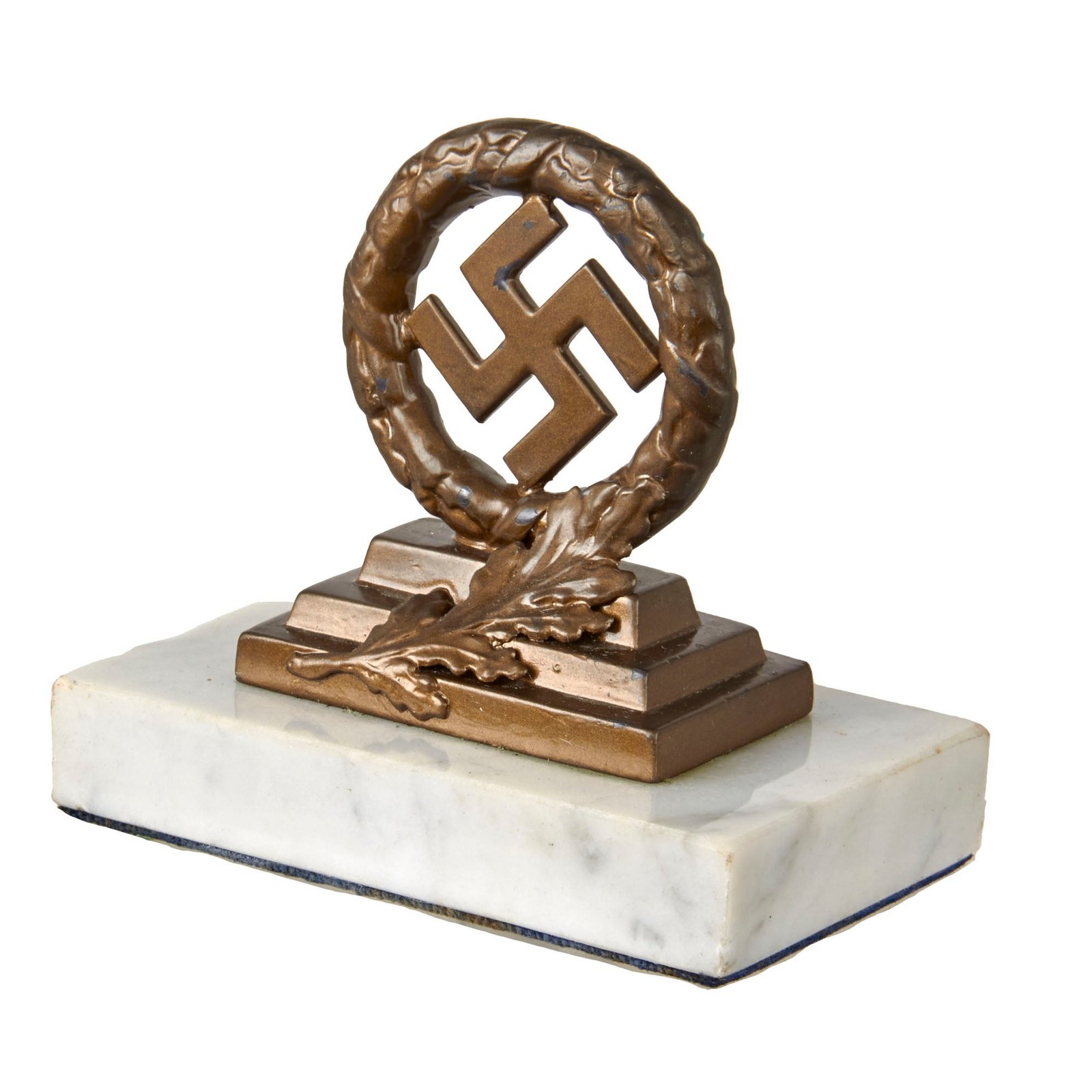 Original German WWII NSDAP Cast Metal Insignia on White Marble Base