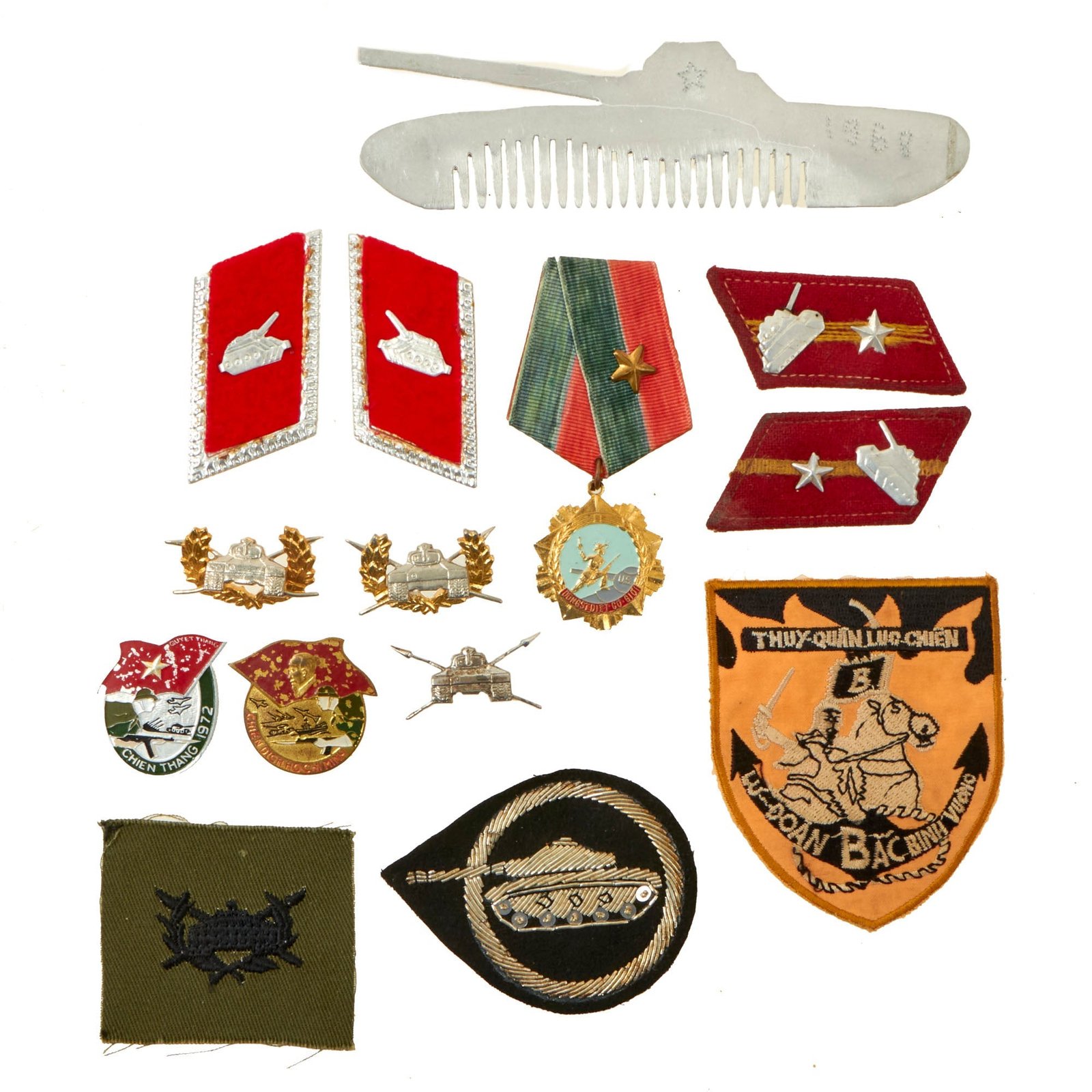 Buy Original Vietnamese Vietnam War Era Collection of North & South Tank Insignia with Custom Made Aluminum Tank Comb - 14 Items Total | Original Firearms Antique For Sale