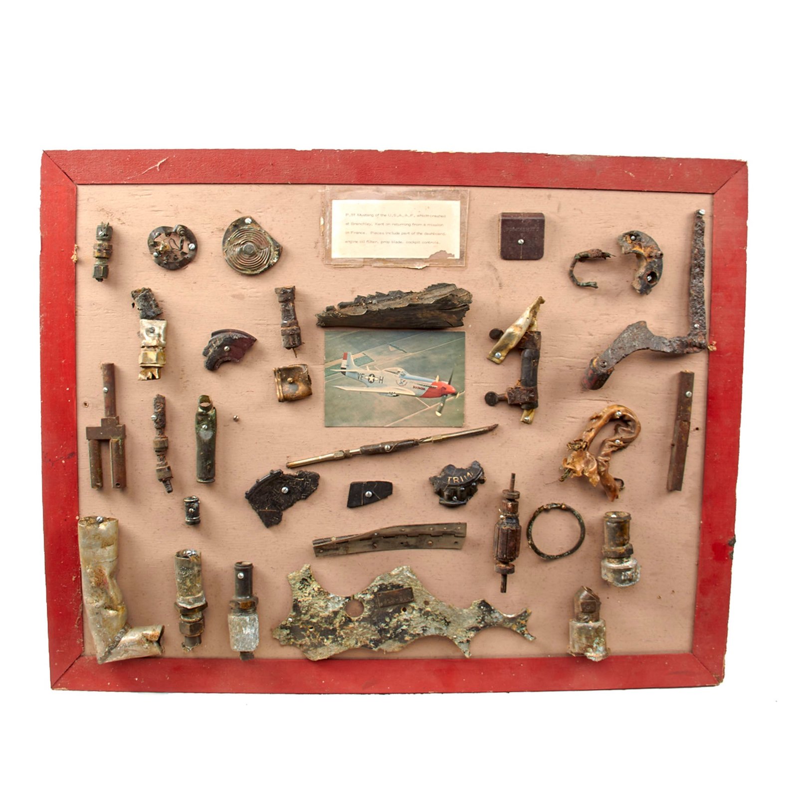 Original U.S. WWII P-51 Mustang Relic Board with 31 Pieces of P-51 Crashed in Brenchley, Kent, England upon Returning from Mission in France - 24 x 29¾”
