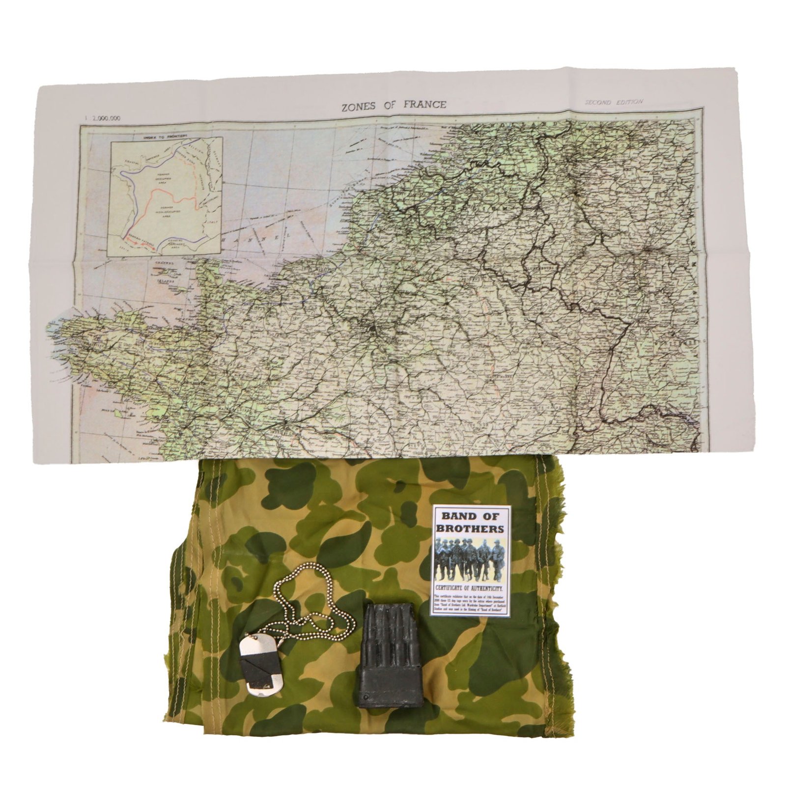 Original U.S. Band of Brothers Dog Tag Set, Rubber M1 Garand Clip, Parachute Material “Scarf”, and Map Used in Show