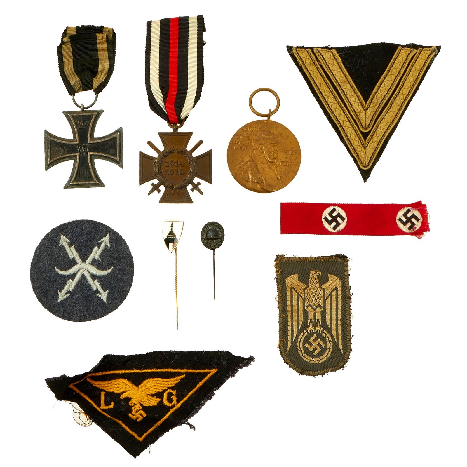 Buy Original German WWI & WWII Medal and Insignia Grouping with Iron Cross 1914 2nd Class & SS Chevron - 10 Items | Original Firearms Antique For Sale