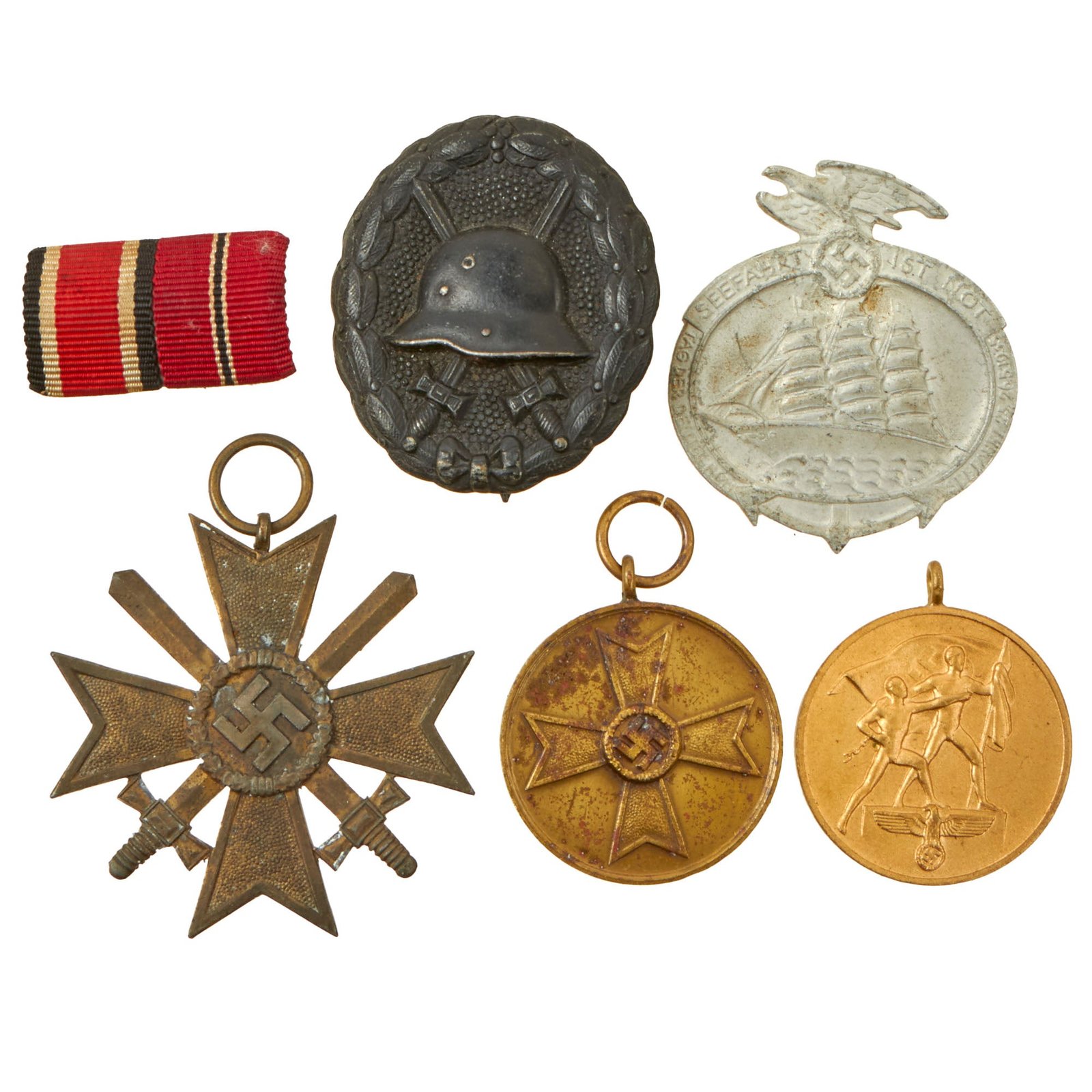 Buy Original German WWII Award and Tinnie Grouping with KvKII with Swords, War Merit Medal, and More - 6 Items | Original Firearms Antique For Sale