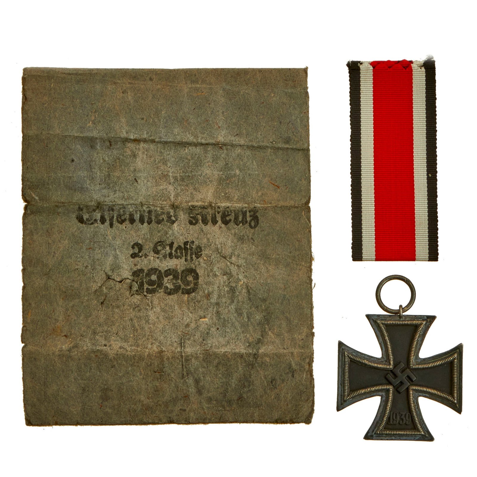 Buy Original German WWII Wehrmacht Iron Cross 2nd Class 1939 with Ribbon in Paper Packet by J.E. Hammer & Söhne | Original Firearms Antique For Sale