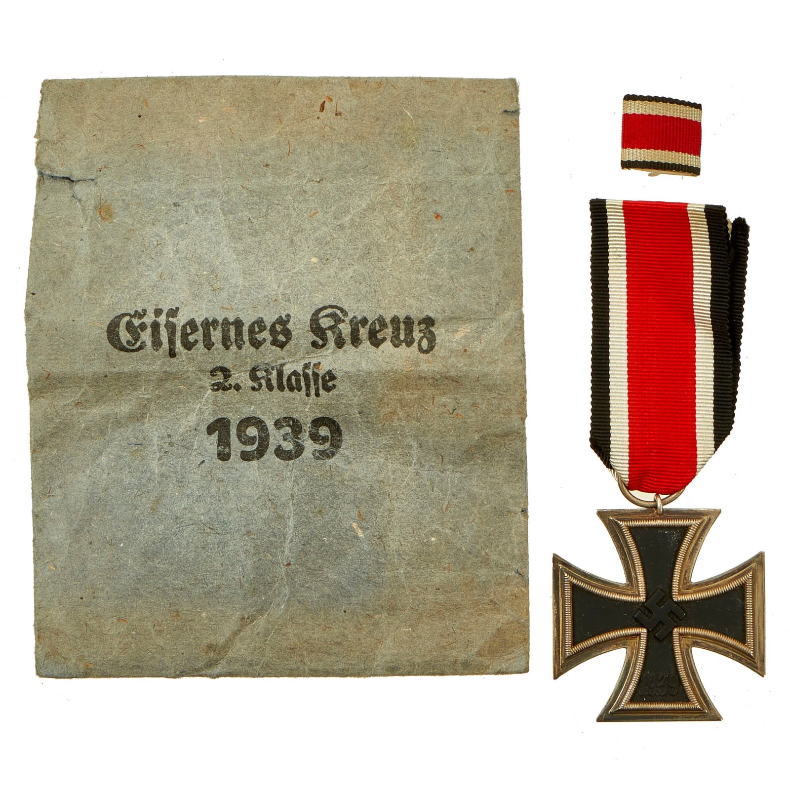 Buy Original German WWII Wehrmacht Iron Cross 2nd Class 1939 with Ribbon & Ribbon Pin in Paper Packet | Original Firearms Antique For Sale