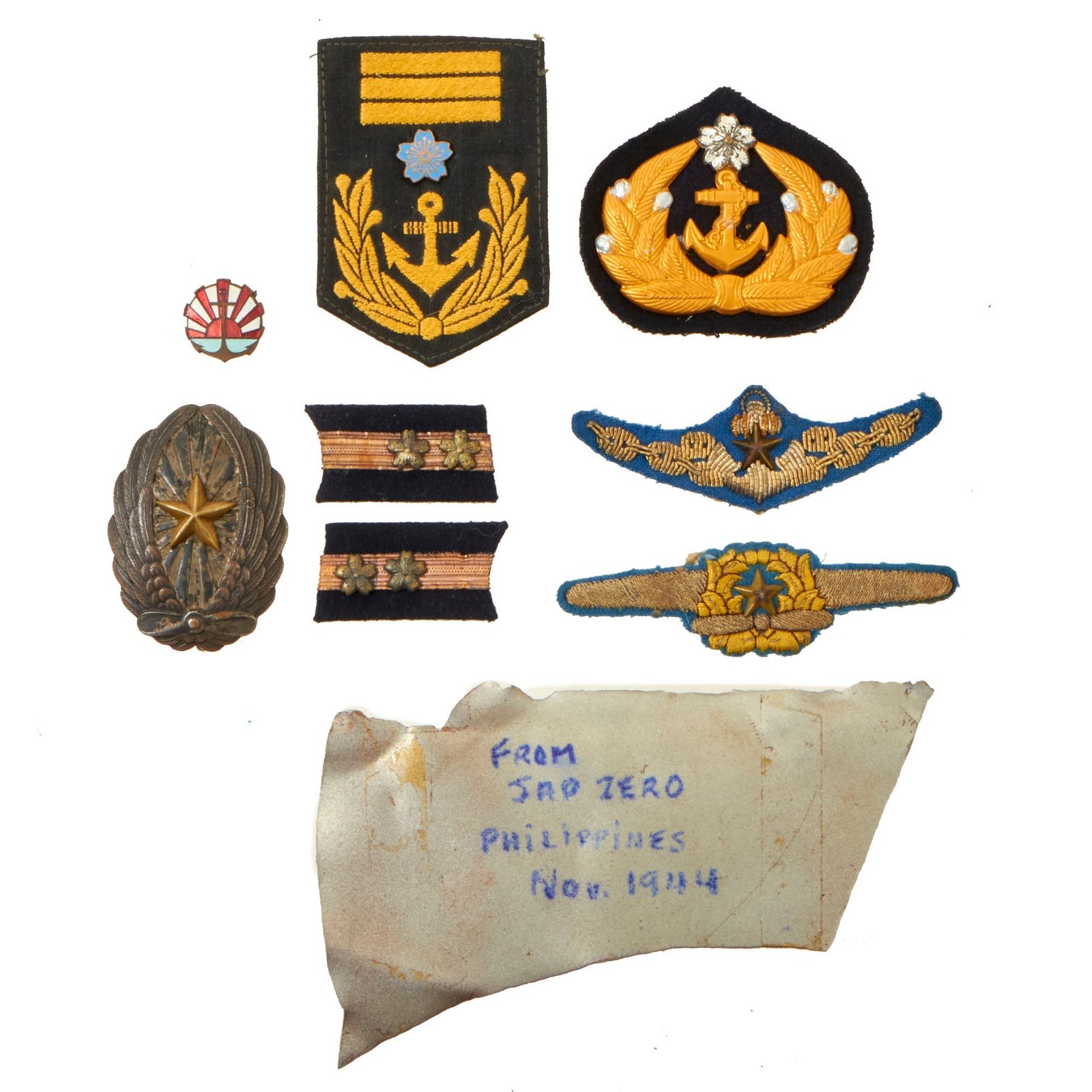Buy Original Japanese WWII Imperial Japanese Army Air Service Pilot Wings and Navy Insignia Grouping Feauturing “Japanese Zero” Aircraft Piece - 9 Items | Original Firearms Antique For Sale