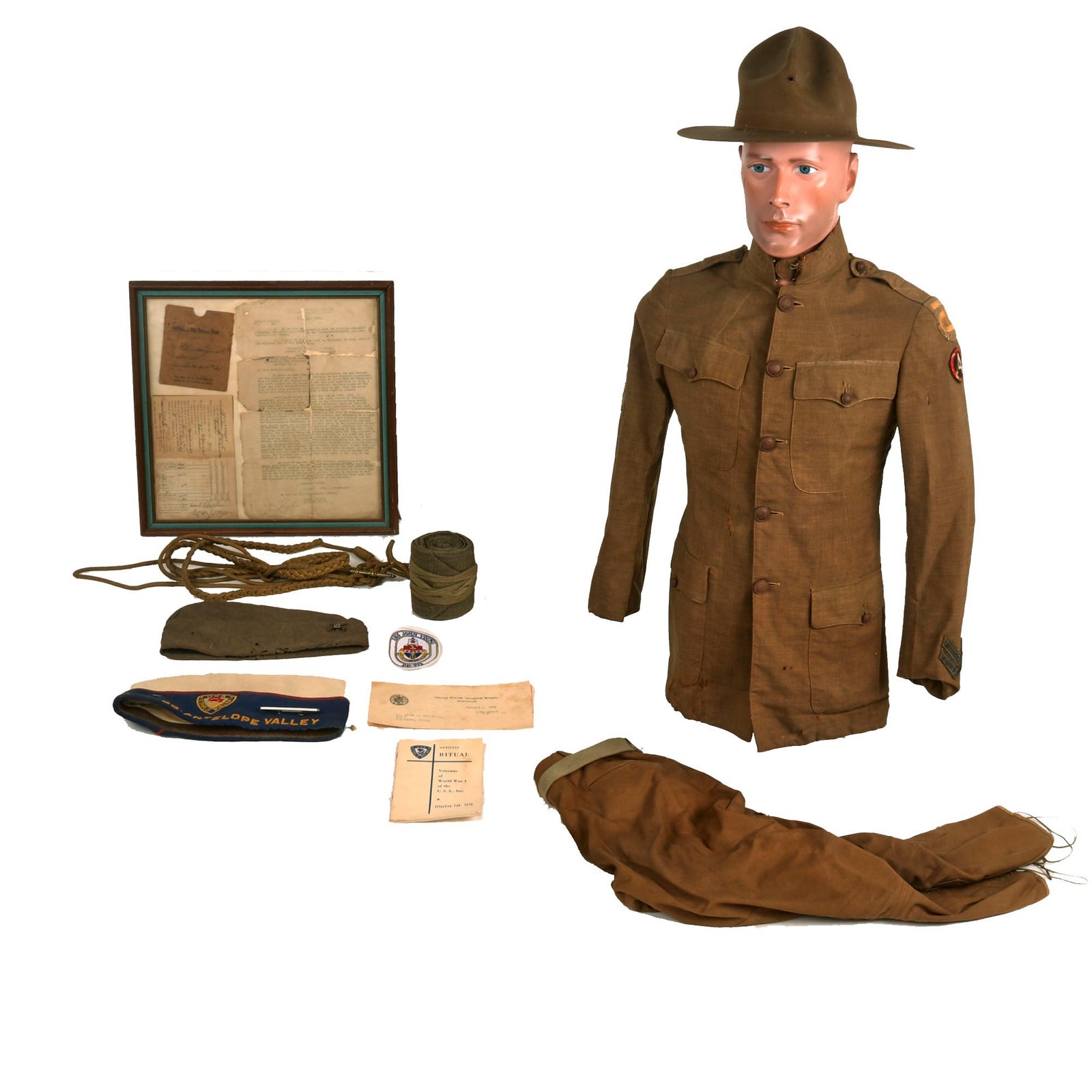 Buy Original U.S. WWI Named Tough ‘Ombres 90th Division Uniform Grouping - Double Patched Uniform - Bag of Captured German Souvenirs | Original Firearms Antique For Sale