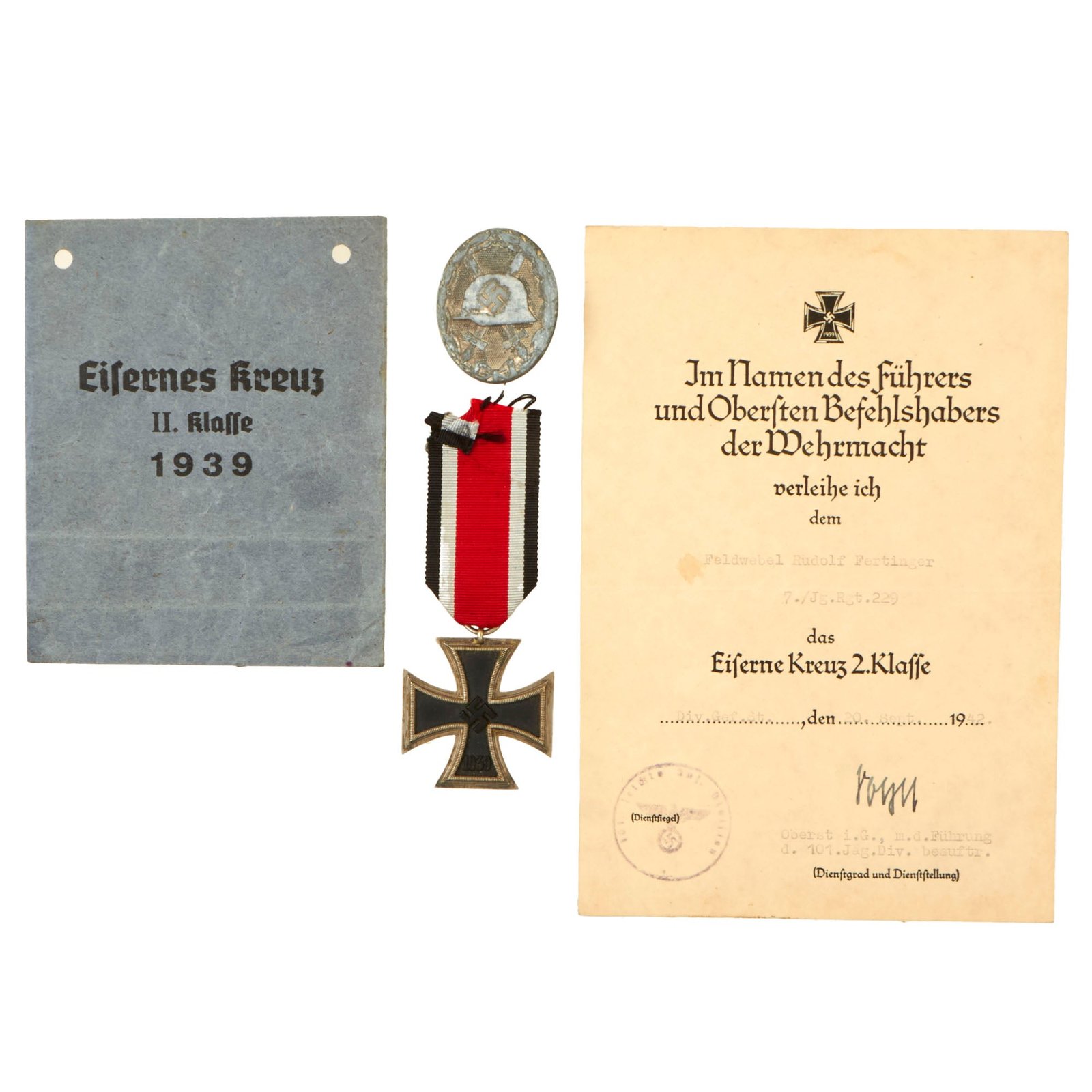Buy Original German WWII Iron Cross 2nd Class 1939 EKII with Award Document, Packet, Ribbon, and Silver Wound Badge - 229th Jäger Regiment | Original Firearms Antique For Sale