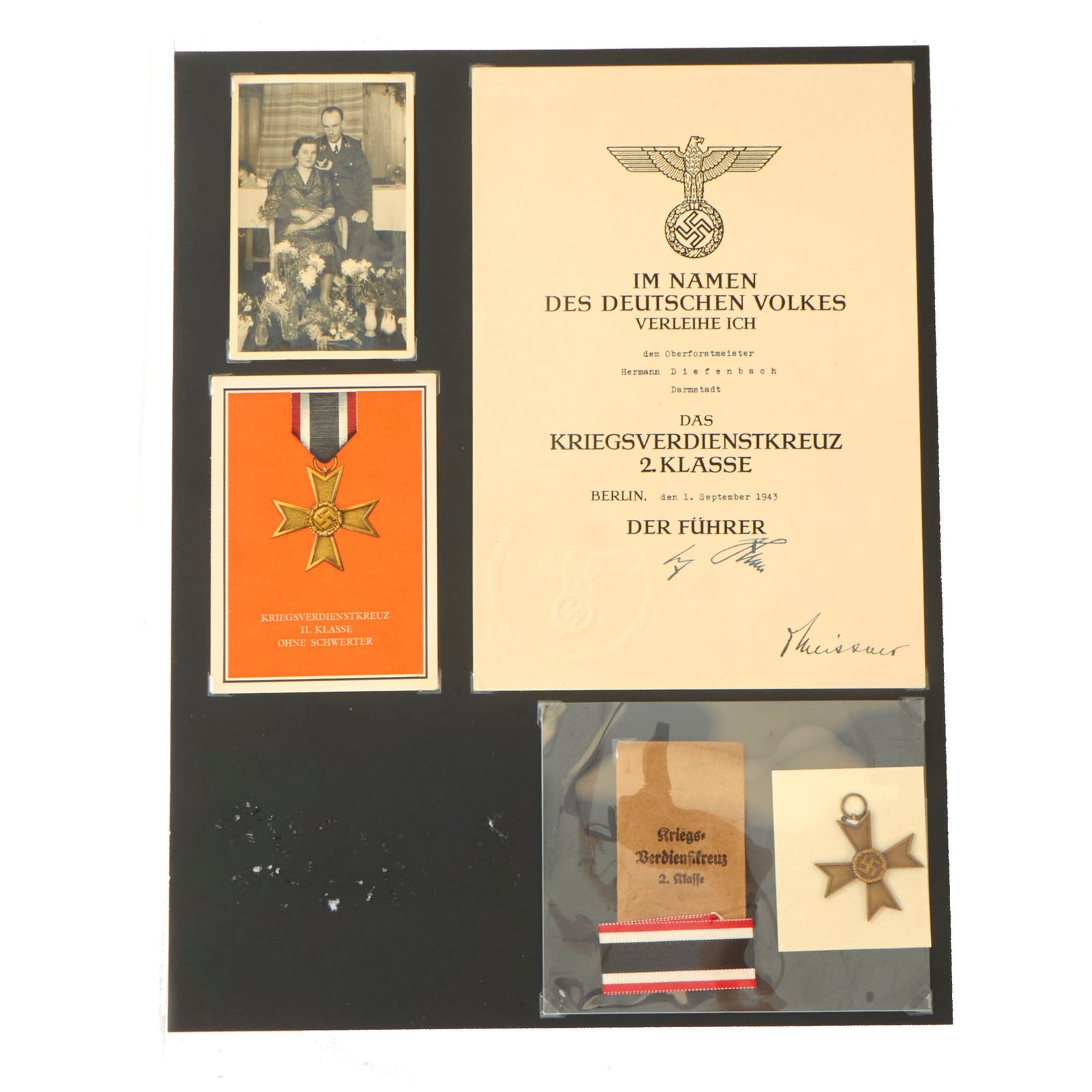 Buy Original German WWII Named War Merit Cross 2nd Class Grouping with Photo, Award Document, Postcard & More on Display Board | Original Firearms Antique For Sale