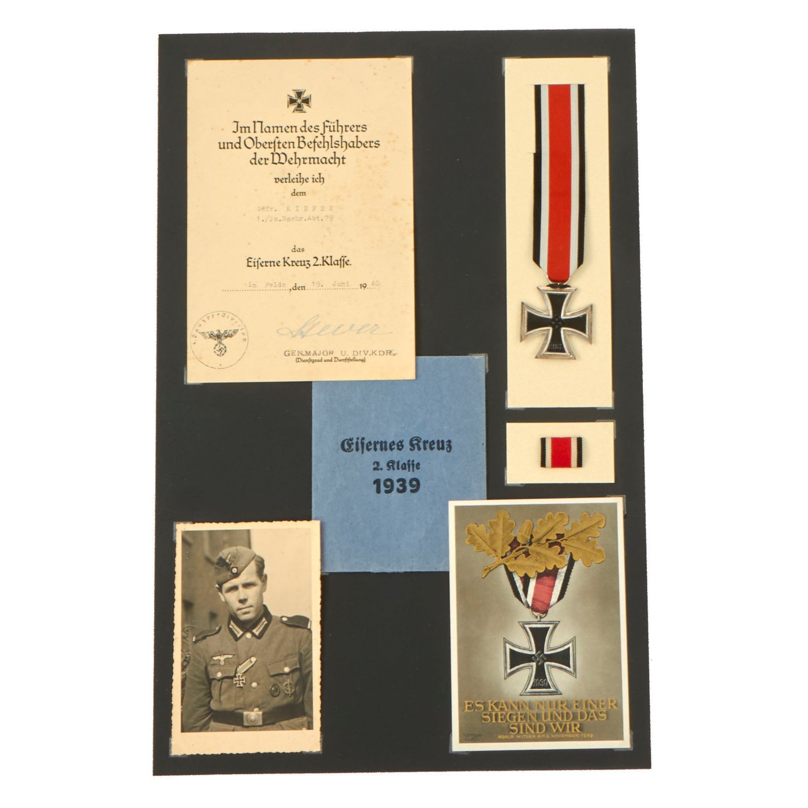 Buy Original German WWII Named Iron Cross 2nd Class 1939 Grouping with Photo, Award Document, Postcard & More on Display Board | Original Firearms Antique For Sale