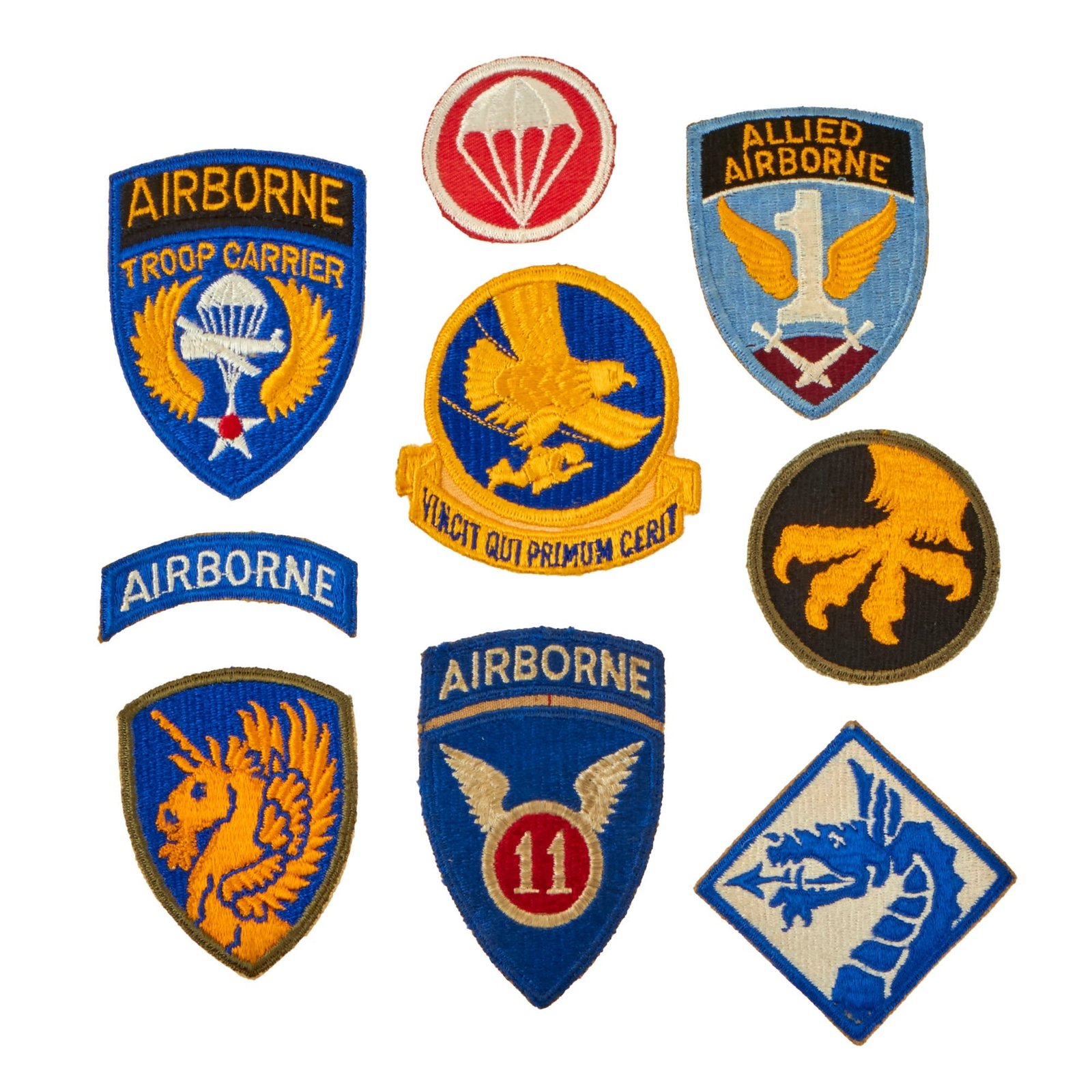 Buy Original U.S. WWII Airborne Patch Lot - 11th, Allied Airborne, Troop Carrier, Etc. - 8 Pieces Total | Original Firearms Antique For Sale